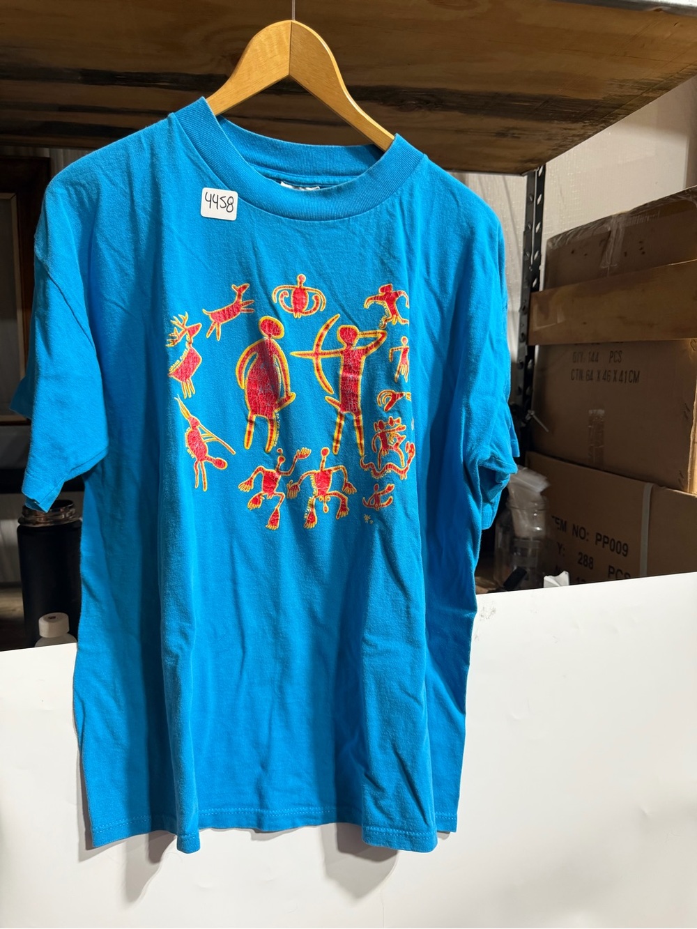#4458-Women's Bright Blue Short-Sleeve Graphic Tee with Yellow & Red Accents